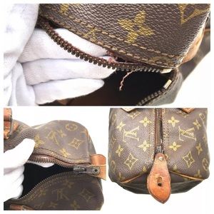 Handbag in need of zipper repair.